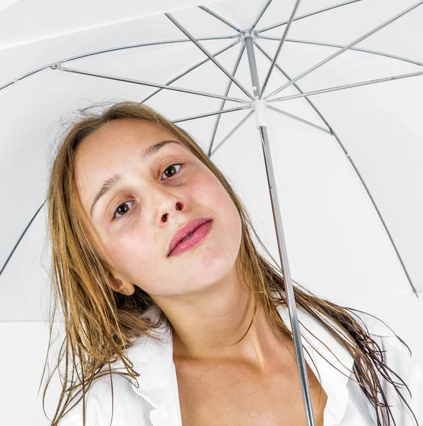 Girl poses with umbrella in studio — Stock Photo, Image