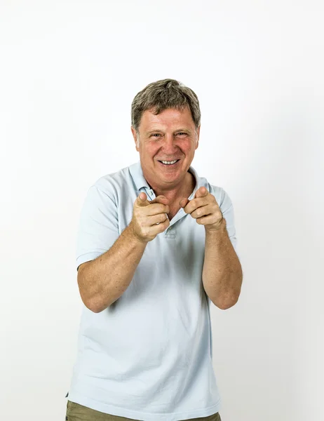 Handsome smiling man in blue leisure polo shirt Royalty Free Stock Images