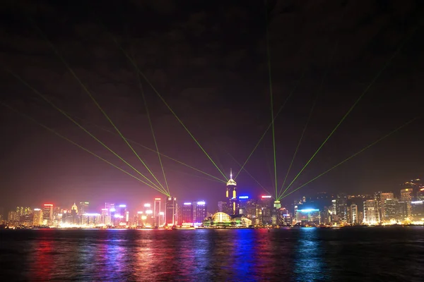 Hong Kong skyline at night with laser beams — Stock Photo, Image