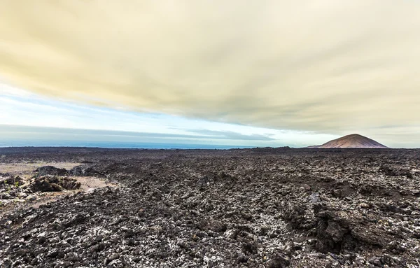 Pôr-do-sol no Parque Nacional Vulcânico Timanfaya em Lanzarote — Fotografia de Stock