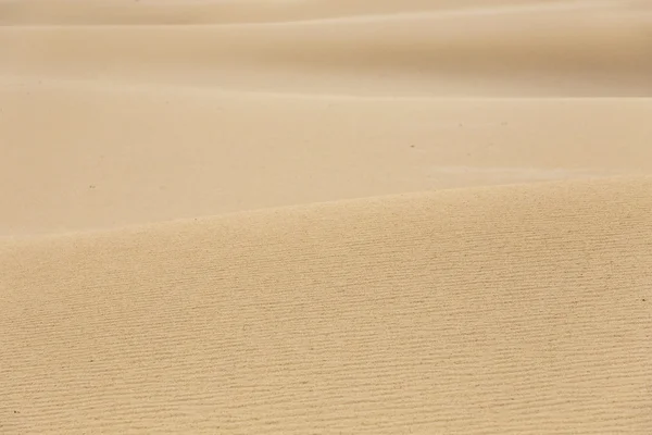 Arena del desierto patrón textura fondo de la arena en la duna —  Fotos de Stock