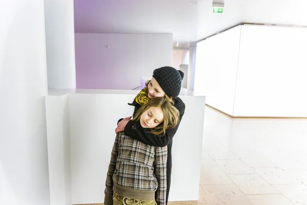 Sisters hugging in love — Stock Photo, Image