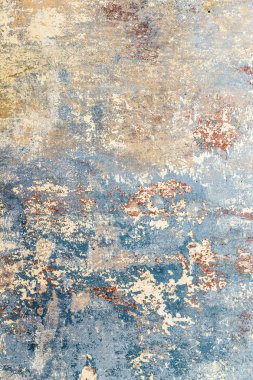 Eski bir evin eski grunge duvarı. Renk kalıntıları. 