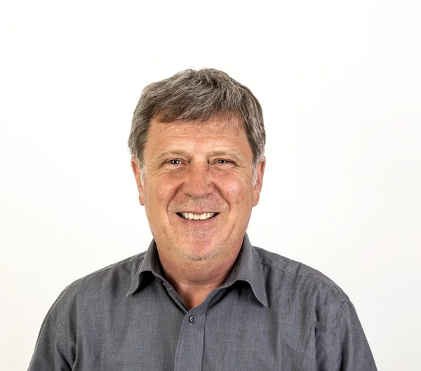 Smiling mature man with grey polo shirt — Stock Photo, Image