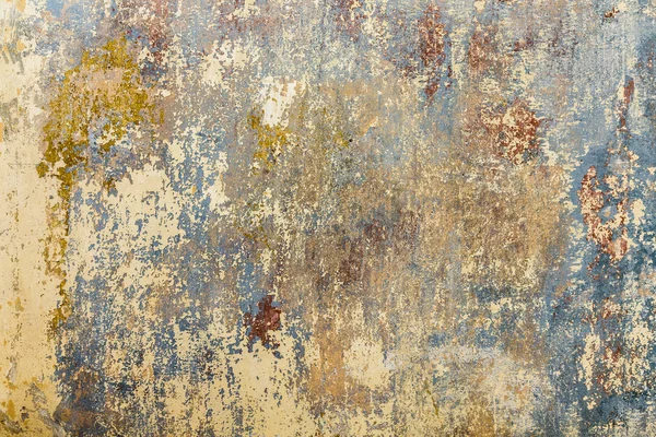 Gammal grunge vägg i ett gammalt hus med rester av färg — Stockfoto