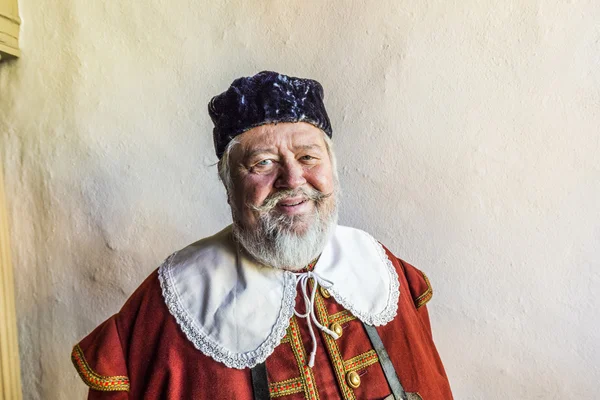 Old man dressed in medieval clothes in Rothenburg — Stock Photo, Image