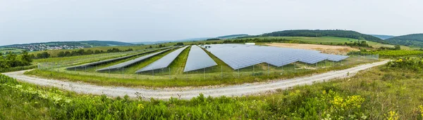 Solar panel under cloudy sky — Stock Photo, Image