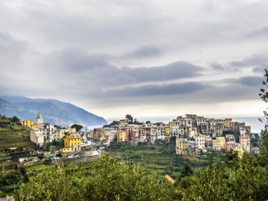 typical old village in the Levante, Italy under cloudy sky clipart
