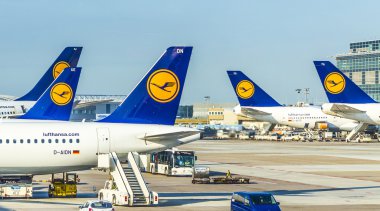  Terminal 1 with passengers airplane decking in Frankfurt, Germa clipart