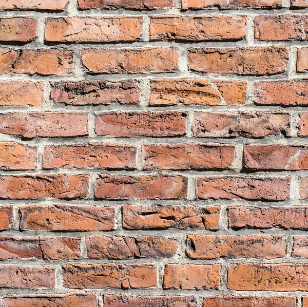 Fragment einer roten Ziegelmauer — Stockfoto