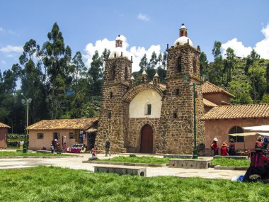 people visit the church San Pedro de Cacha in Raqchi