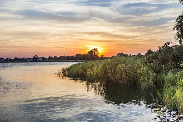 Západ slunce v Zinnowitz s zapadákov — Stock fotografie