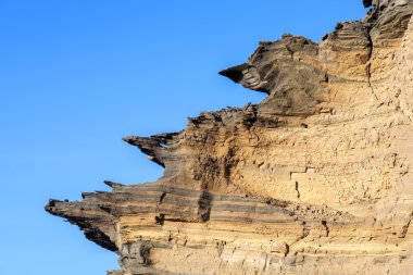 volcanic stone formation with blue sky at el Golfo 