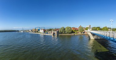 view at river Peene to dockyard area in Wolgast