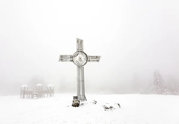 Summit cross in snow at Feldberg — Stock Photo, Image