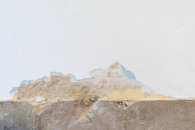 yenilenmekte olan bir evin duvarındaki farklı katmanların arkaplanı