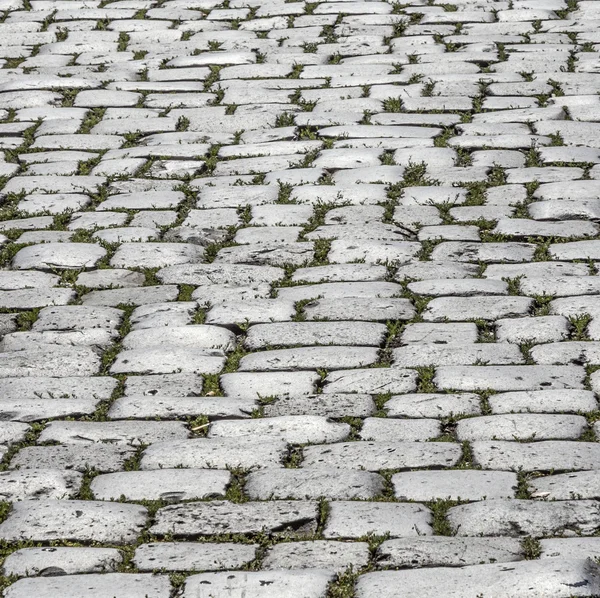 Arka plan olarak Arnavut kaldırımlı yol — Stok fotoğraf