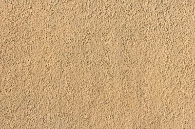 Kaba oktav alçı duvarının deseni harmonik bir arkaplan verir