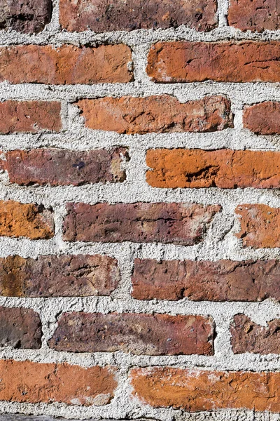 Muro di pietra di mattoni intemperie — Foto Stock
