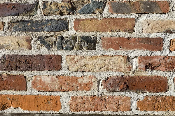 Weathered brick stone wall — Stock Photo, Image