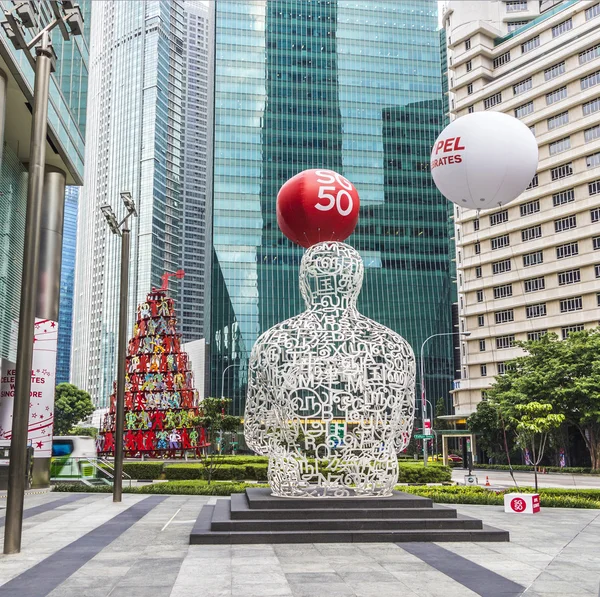 Skulptur Singapore själ från Jaume Plensa i den finansiella centen — Stockfoto