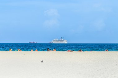 People enjoy south beach  in Miami