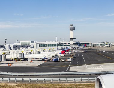 Air Traffic Control Tower and Terminal 4 with Air planes at the