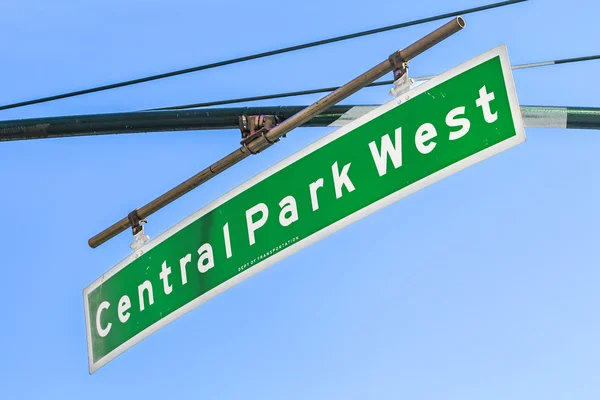 Street sign suspended above Central Park West in New York City — Stock Photo, Image