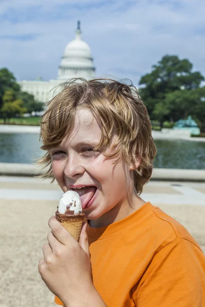 Young boy eating a tasty ice cream Royalty Free Stock Images