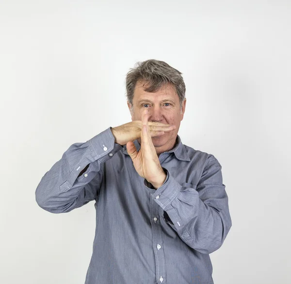 Retrato de un hombre de cincuenta años mostrando emociones —  Fotos de Stock