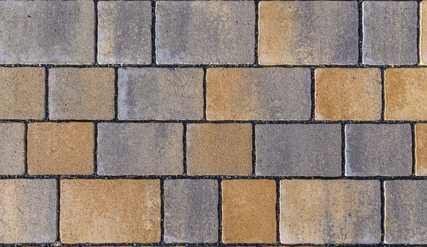 Paving blocks made of square stone in bright ligh — Stock Photo, Image