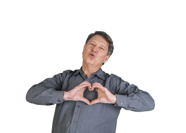 Man gives a kiss in the air and shows heart sign with hands — Stock Photo, Image