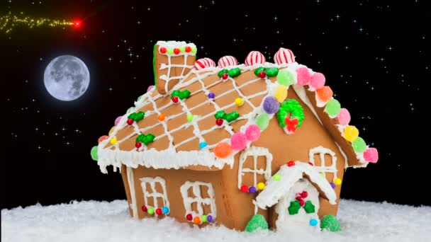 Ein Lebkuchenhaus Während Einer Verschneiten Weihnacht Zeigt Eine Festliche Sternschnuppe — Stockvideo