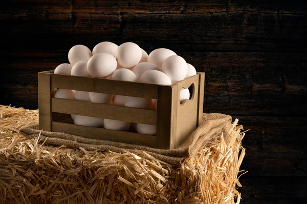 Small Wooden Crate Freshly Collected Eggs Sitting Burlap Hay Bale — Stock Photo, Image