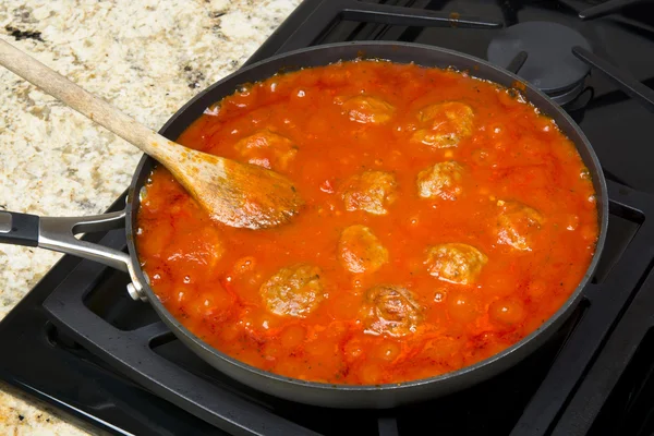 Cooking marinara and meatballs — Stock Photo, Image