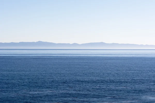 Island over ocean — Stock Photo, Image