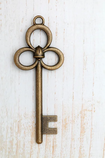 Old key on table — Stock Photo, Image