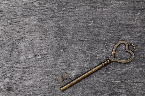 Heart shaped vintage key — Stock Photo, Image