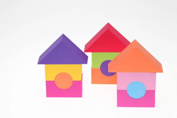 Toy house construction by plastic blocks — Stock Photo, Image
