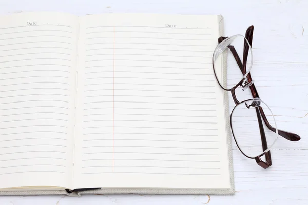 Szemüveg és notebook — Stock Fotó