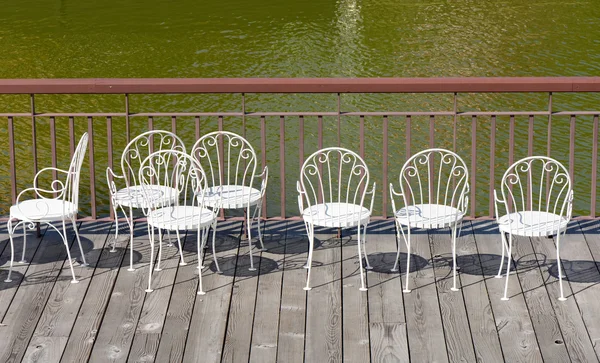 Empty white chairs — Stock Photo, Image