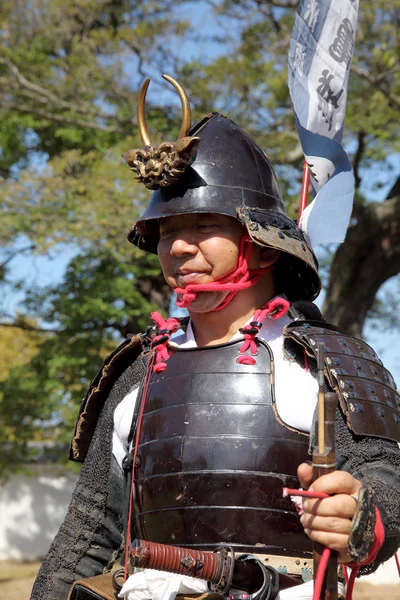 Japanse samurai met oude geweer Rechtenvrije Stockfoto's