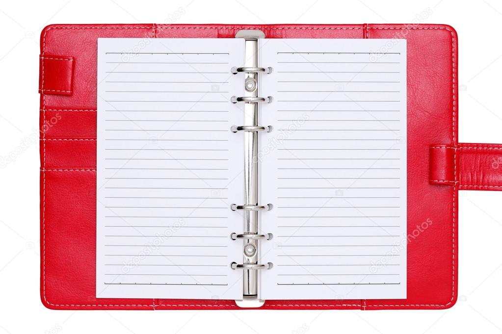 opened red leather notebook