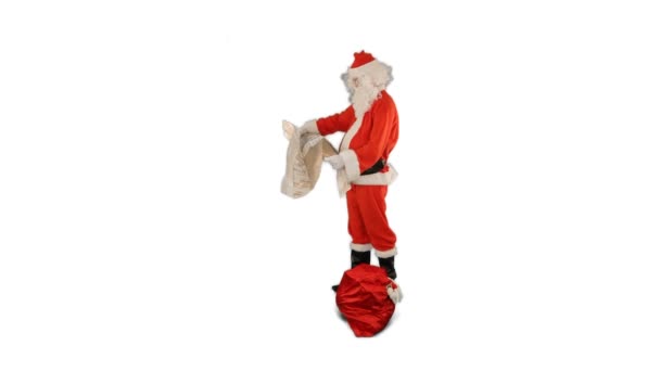 Santa Claus Con Una Bolsa Llena Regalos Mirando Mapa Contra — Vídeos de Stock