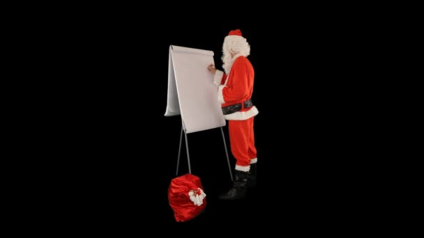 Санта Клаус Сумкой Полной Подарков Составляя Список Хорошими Плохими Детьми — стоковое видео