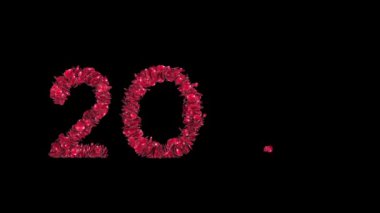 2021 Yeni Yıl tabelası siyah arkaplanlara karşı gül yapraklarından yapılmış.