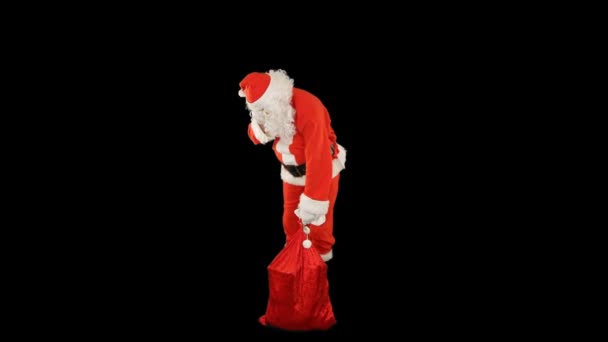 Santa Claus Hablando Por Teléfono Móvil Con Bolsa Llena Regalos — Vídeo de stock