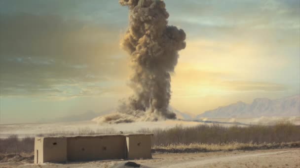 아프가니스탄의 사막에서 폭탄이 폭발하여 아름다운 선셋에 대항하여 — 비디오
