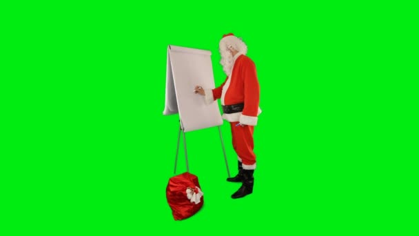 Santa Claus Сумкою Наповненою Подарунками Малює Ділову Діаграму Green Screen — стокове відео