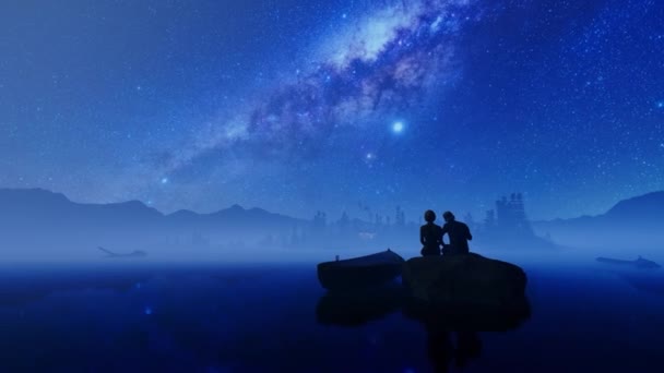 Couple Sitting Rock Isolated Cottage Mountain Range Starry Sky Panning — Stock Video